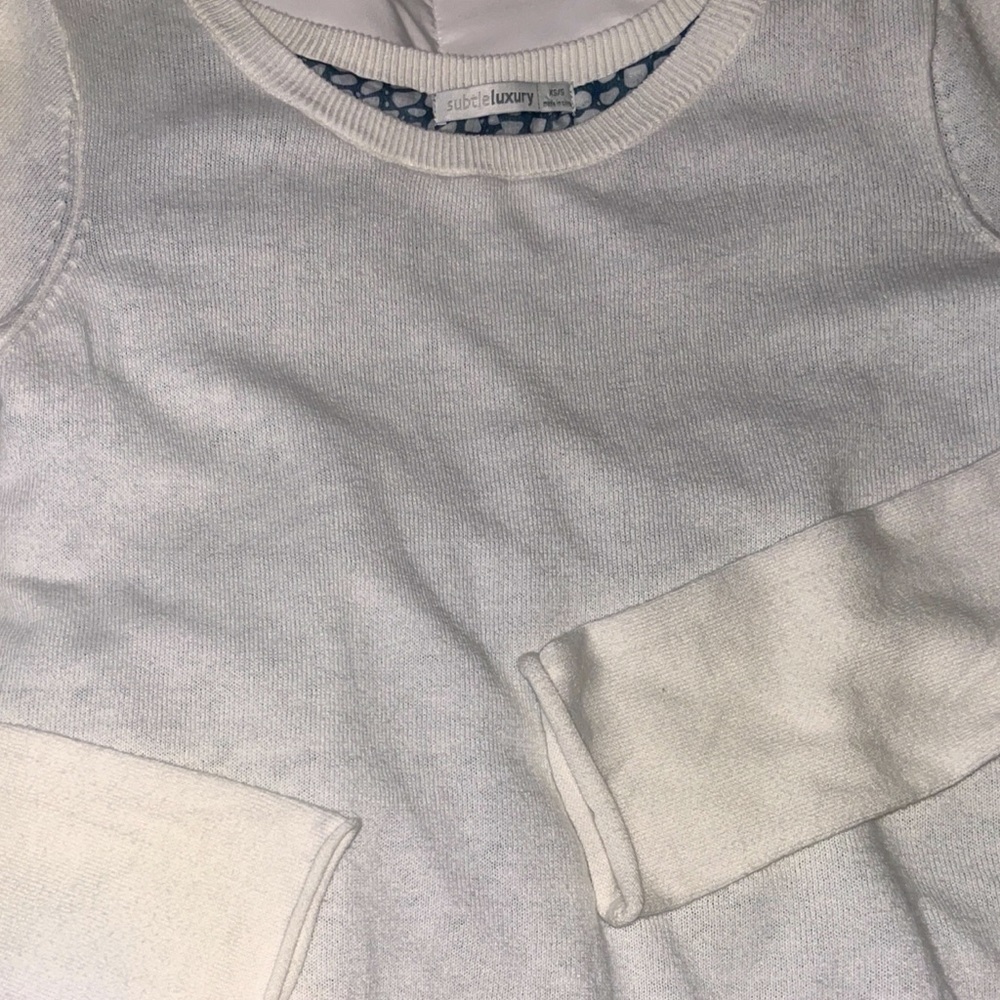 Like cashmere but it’s cotton, nylon. Sz S. Long sleeve sweater, faux blouse